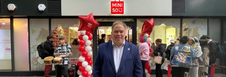 Mayor Perry standing outside a new local shop
