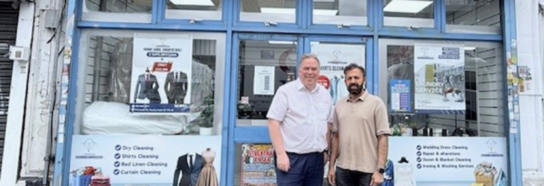 Mayor Perry outside local business