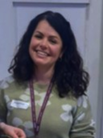 Anneka Gonzalez wearing a light green jumper with white petals