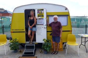 A man and a woman stand outside The Caravan Gallery - credit Dudley People's Archive